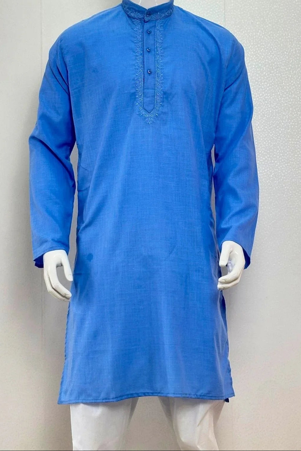 Blue kurta on a mannequin against a plain background