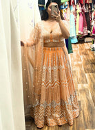 Peach Net Lehenga Choli Set - Boutique Nepal