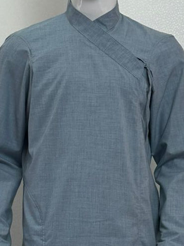 Mannequin wearing a gray Nepali Daura Suruwal outfit with a black cap against a plain background